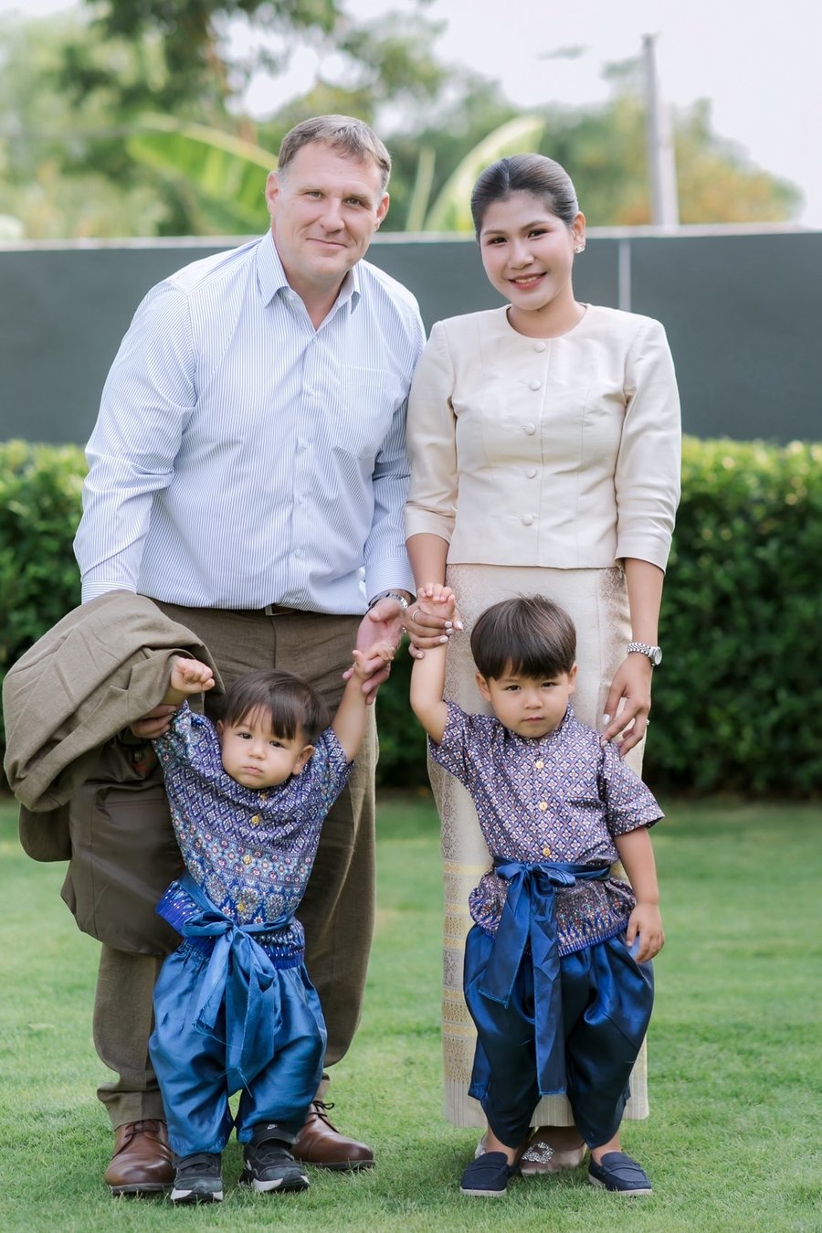 Benjamin Cunningham with his wife and two sons in Surin, Thailand