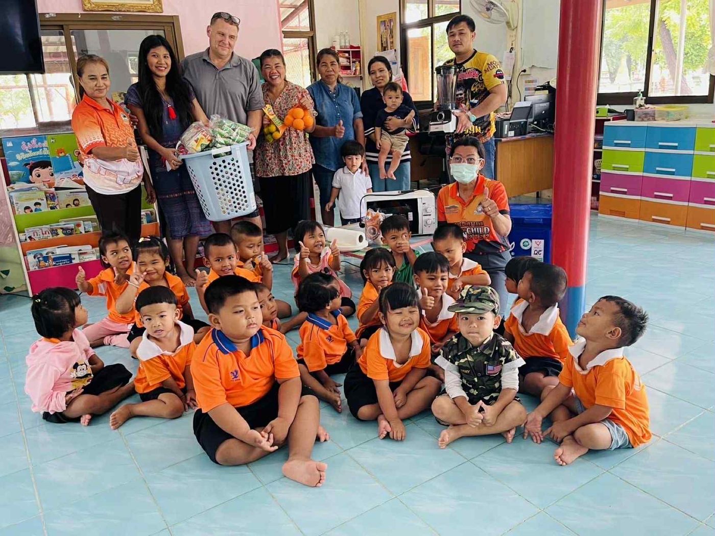 Benjamin Cunningham with students, teachers, and staff at Ban Han Hee School in Surin Province, Thailand
